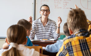 A teacher and her students during a class